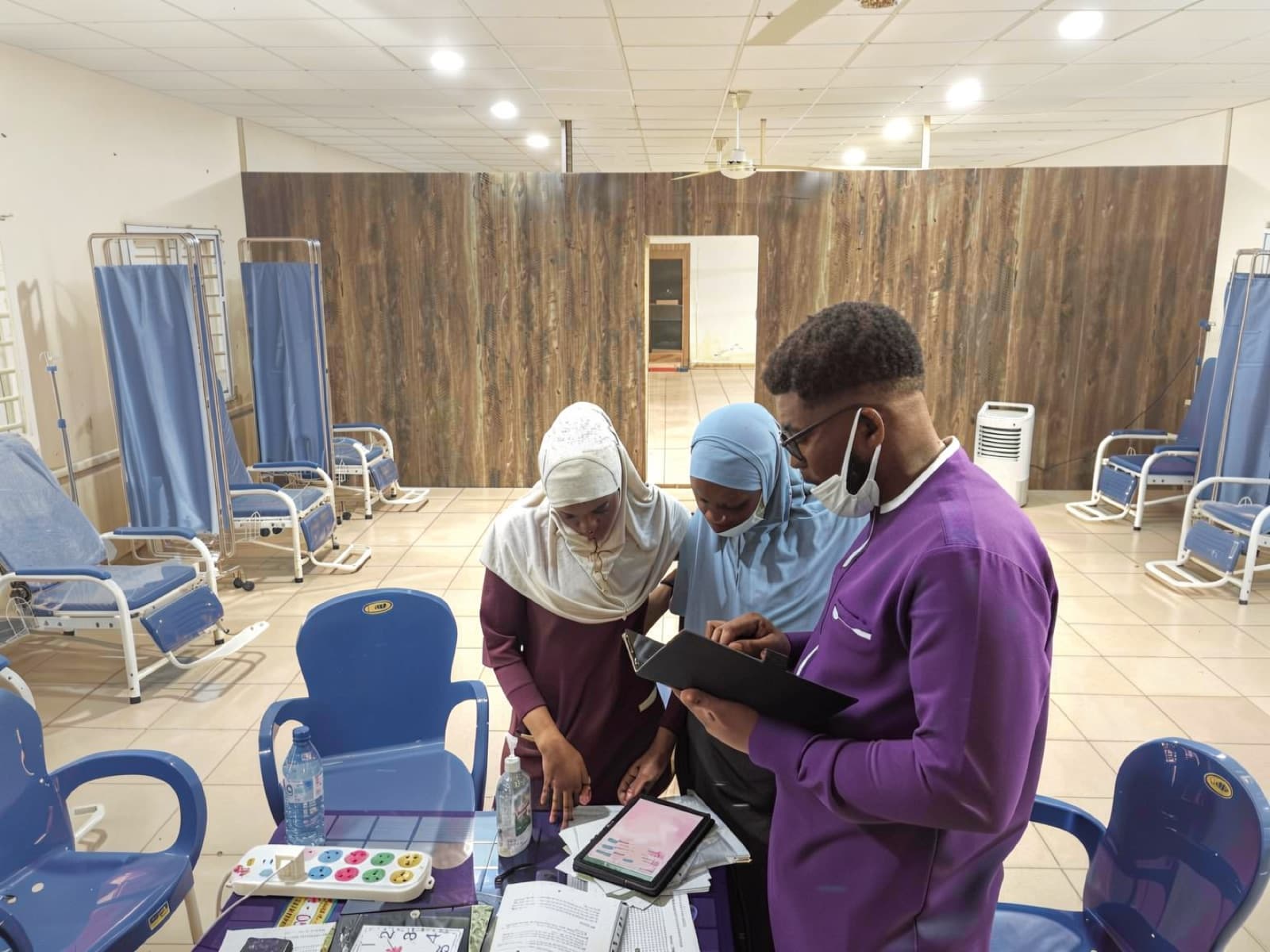 A nurse logging a Kangaroo Care session in the monitoring system