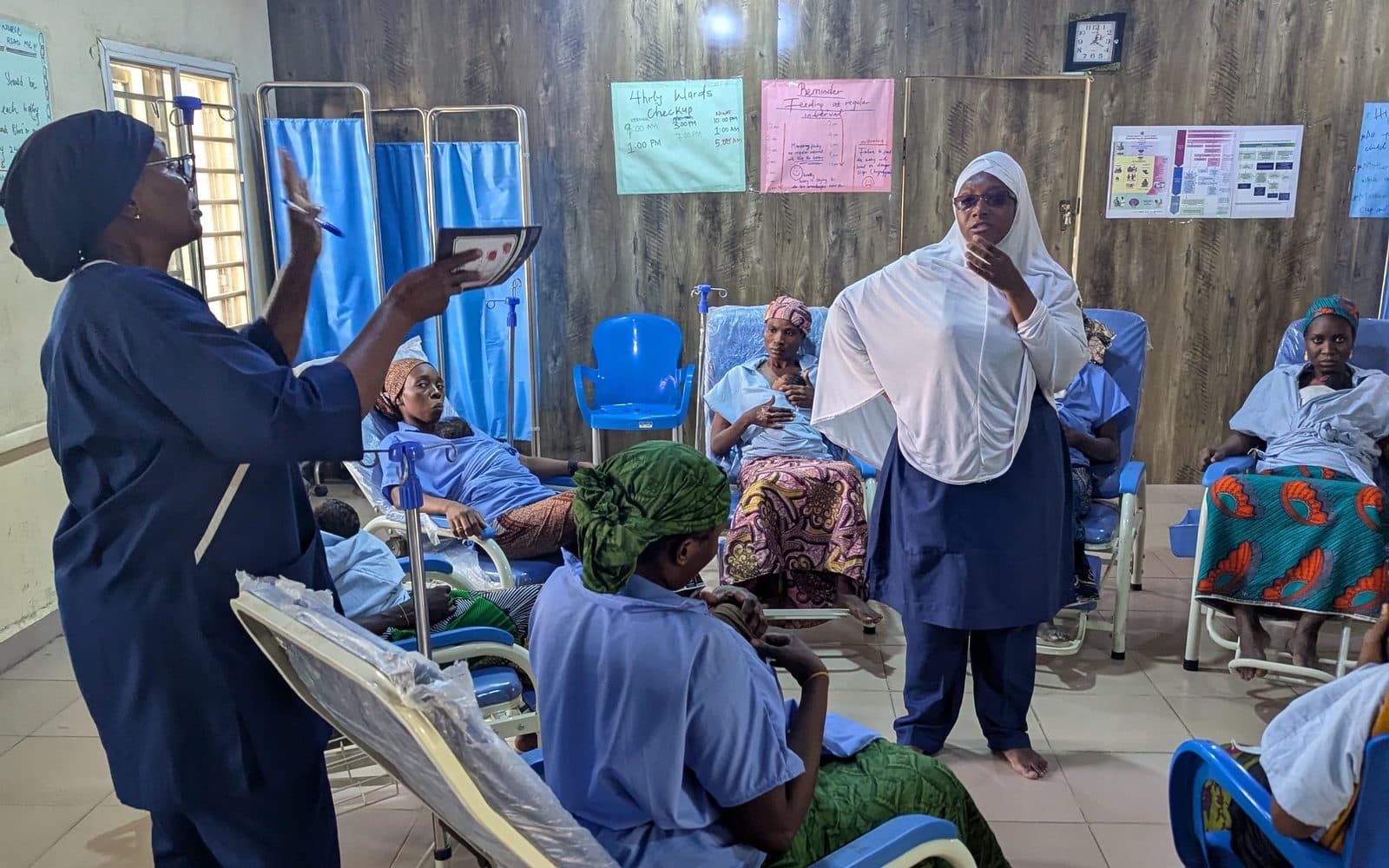 A nurse teaching on the Kangaroo Care ward in Kano